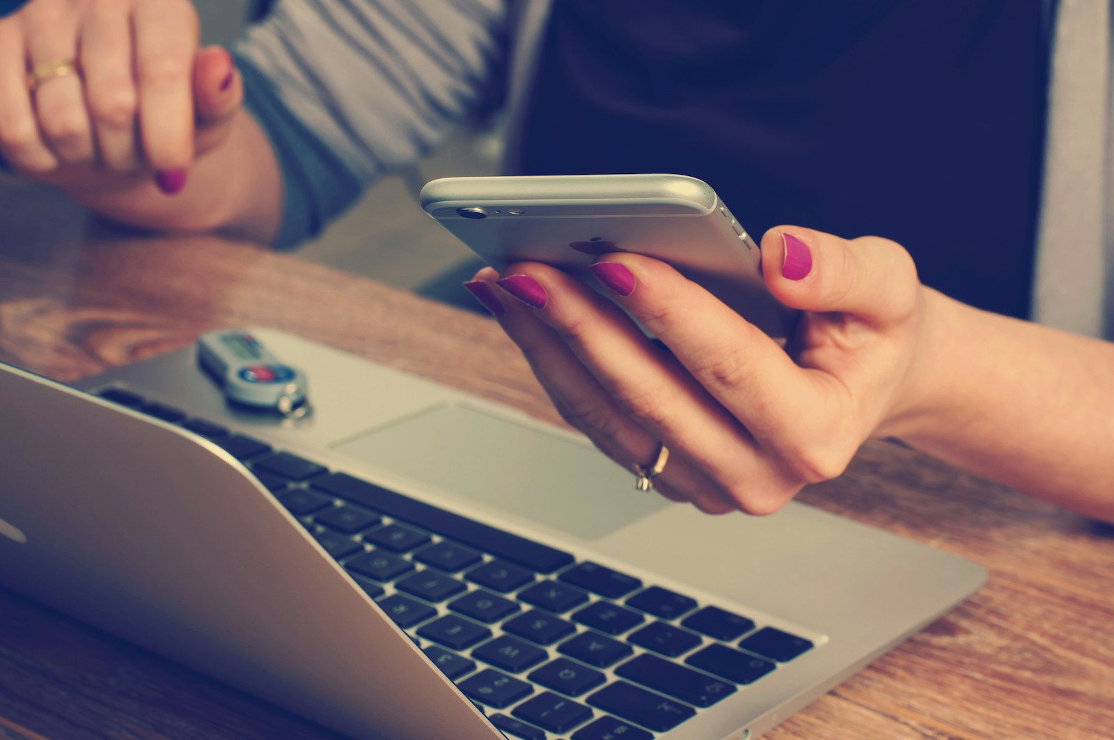 Communication and collaboration — workspace with phone and notebook